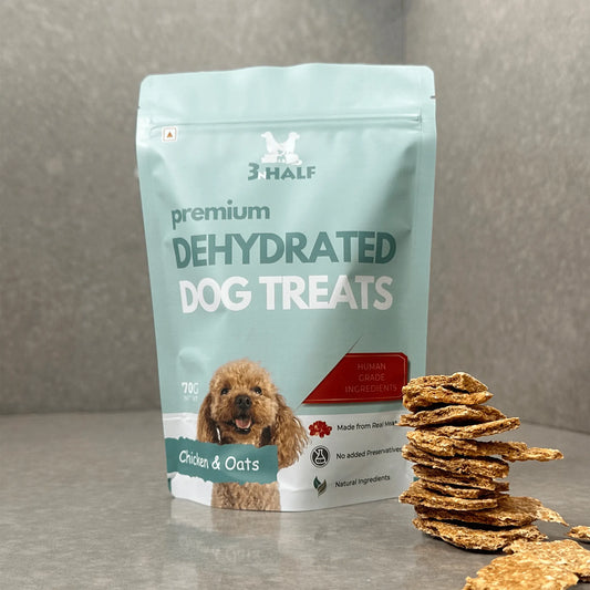 Pack shot of 3nHalf Dehydrated Chicken & Oats dog treats with treats stacked beside